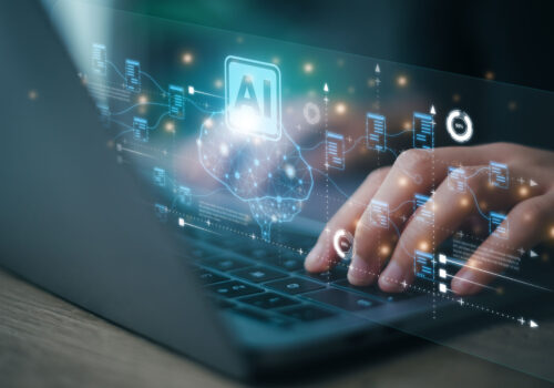 AI or Artificial intelligence concept. Businessman using computer use ai to help business and used in daily life