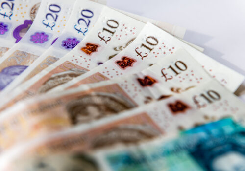 Close up of United Kingdom Pound Sterling bank notes.