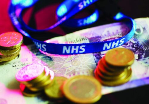 NHS finance - money - NHS ribbon